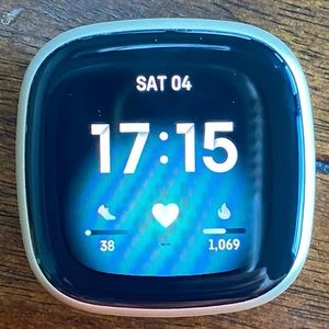 FitBit Versa 3 with 8 various color watch bands.